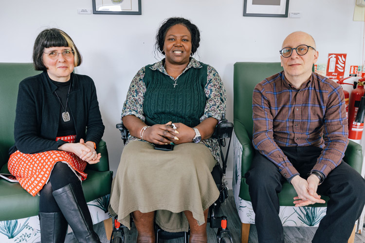 Three people looking at the camera