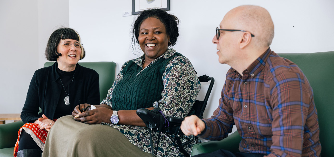 Three people talking